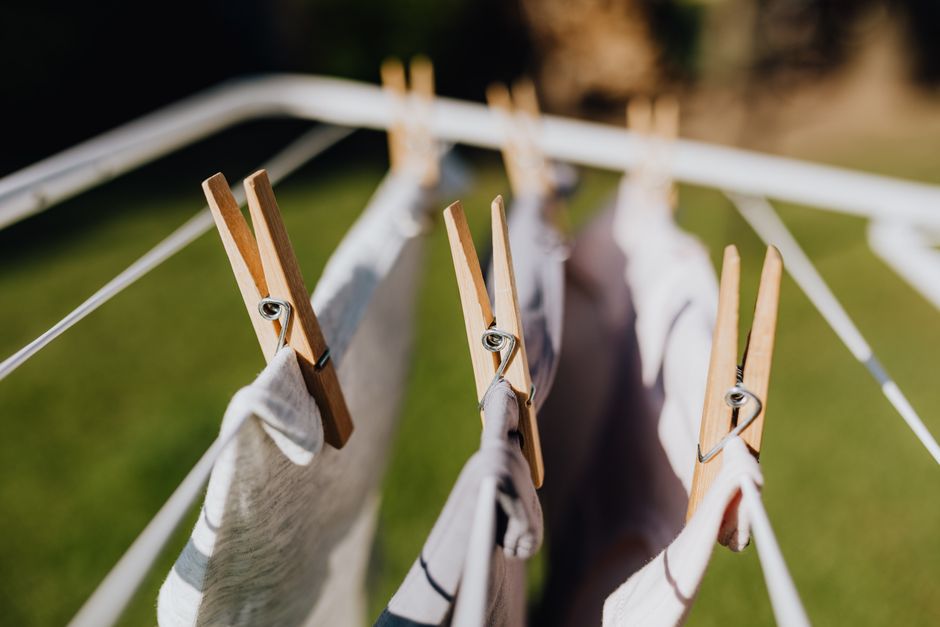 Washing drying indoors on an airer in a small flat